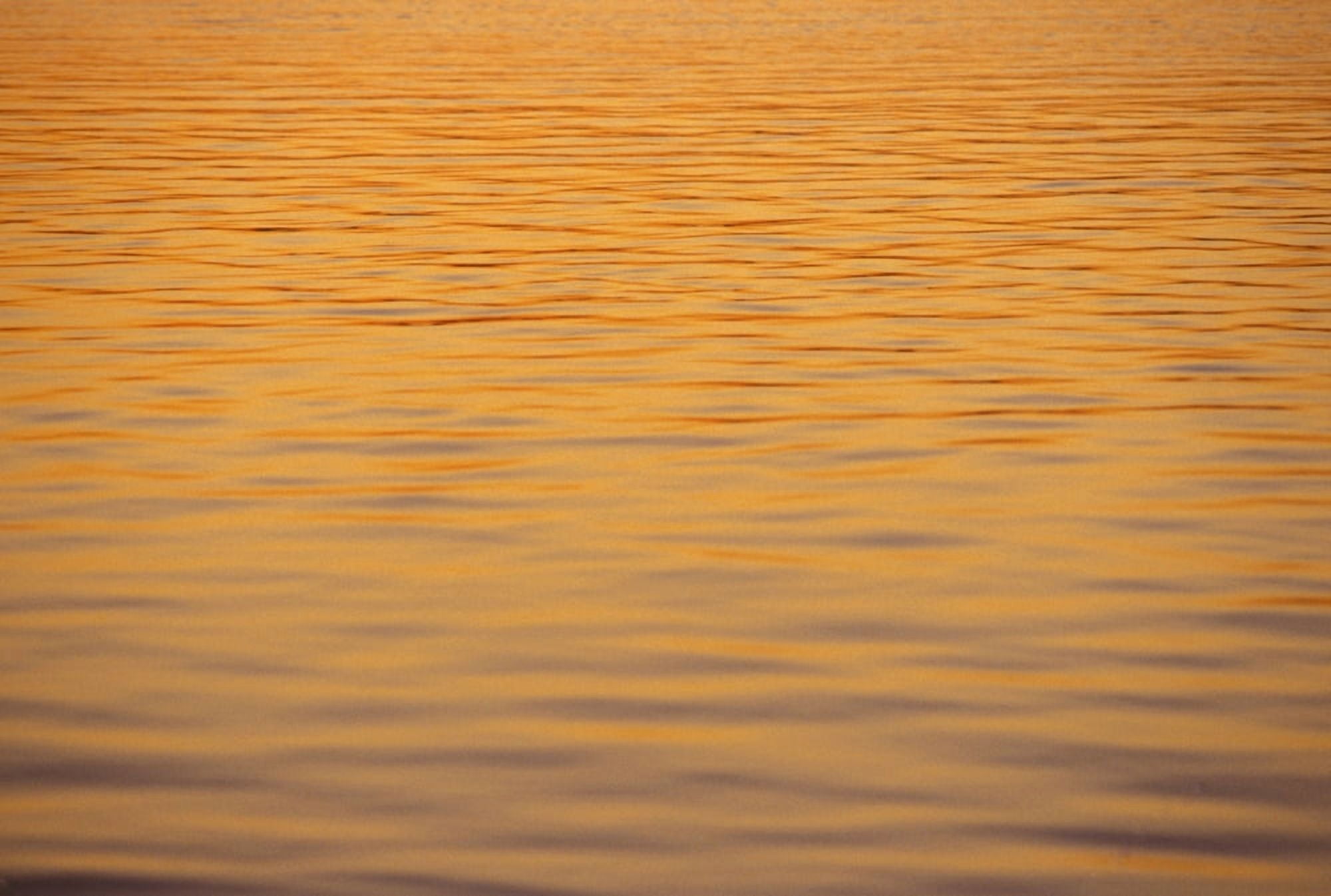 Ocean Shimmering Surface With Sunset Reflections Beautiful Orange Color Canvas Art - Mary Van de Ven Design Pics (34 x 22)