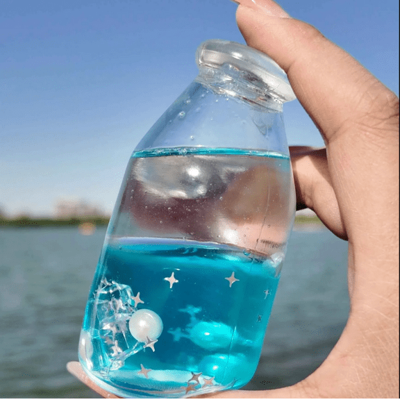 Ocean Squishy Bottle Fidget Toys, Layered Sand Clear Drink Cup Sensory Squishies, Slow Rising TPR Stress Ball with Pearl Charms, Soft Stretch Squeeze Water Bottle Toy for Girls A