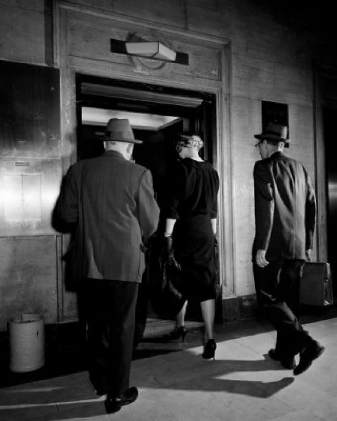 Office workers entering lift Canvas Art - (18 x 24)
