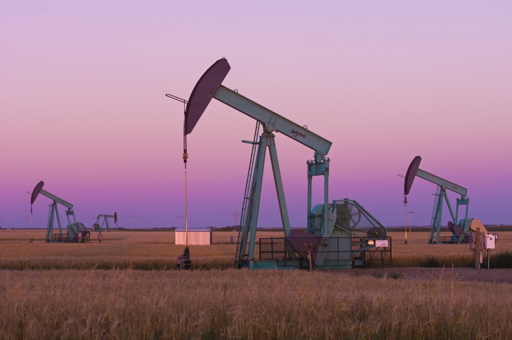 Oil Pump Jacks On Canadian Prairie At Dusk Carlyle Saskatchewan Canvas Art - Mike Grandmaison Design Pics (17 x 11)