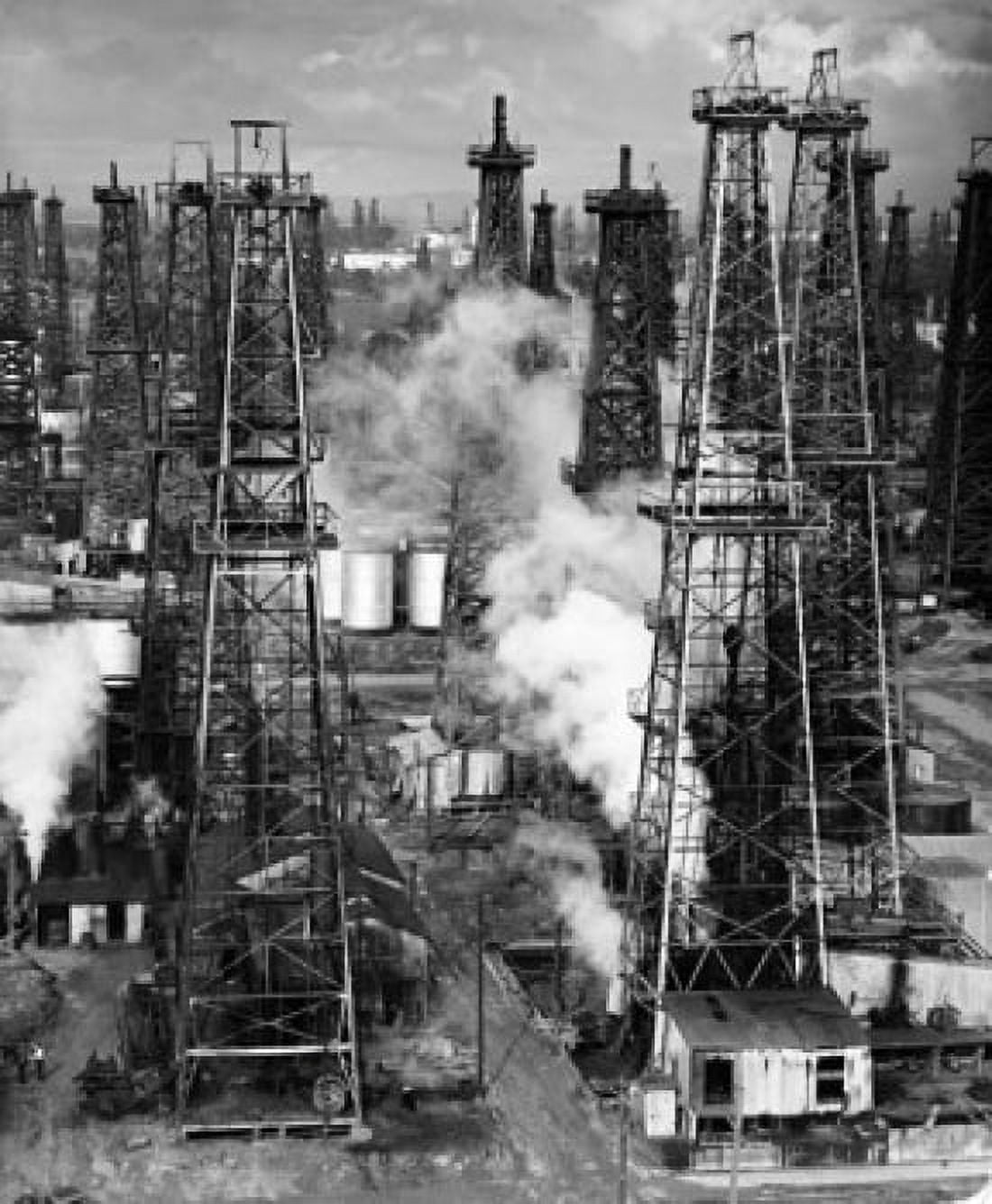 Oil drilling rigs in an oil refinery Signal Hill California USA Canvas Art - (24 x 36)