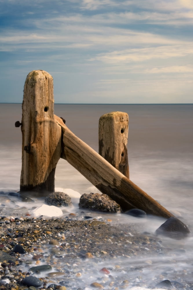 Old Post In Sea Humberside England Canvas Art - John Short Design Pics (22 x 34)