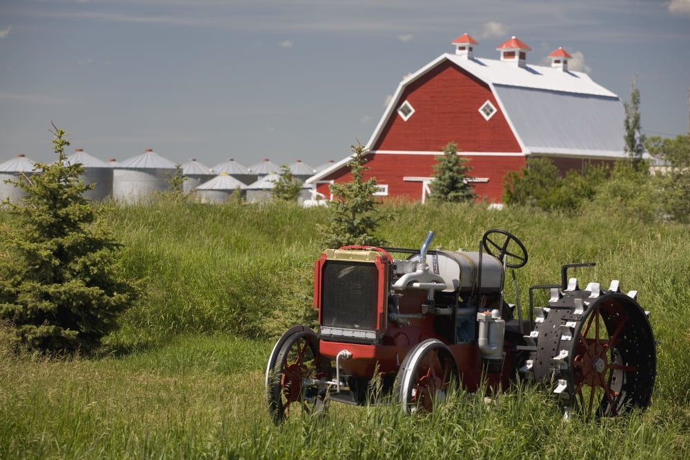 Old Red Tractor In A Field With A Red Barn In The Background Alberta Canada Canvas Art - Michael Interisano Design Pics (38 x 24)