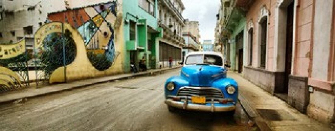 Old car and a mural on a street Havana Cuba Canvas Art - Panoramic Images (15 x 6)