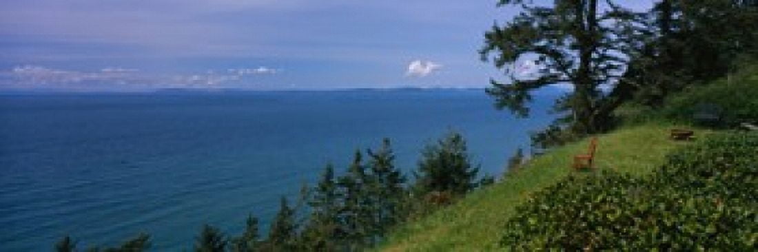 Old red chair near the sea Strait of Juan de Fuca San Juan Islands Whidbey Island Island County Washington State USA Canvas Art - Panoramic Images (18 x 6)