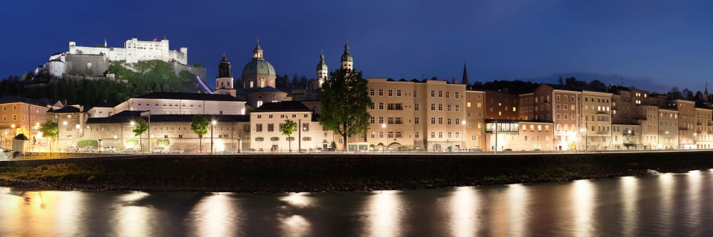 Old town at dusk Hohensalzburg Castle Kollegienkirche Church Salzach River Salzburg Salzburger Land Austria Canvas Art - Panoramic Images (36 x 12)