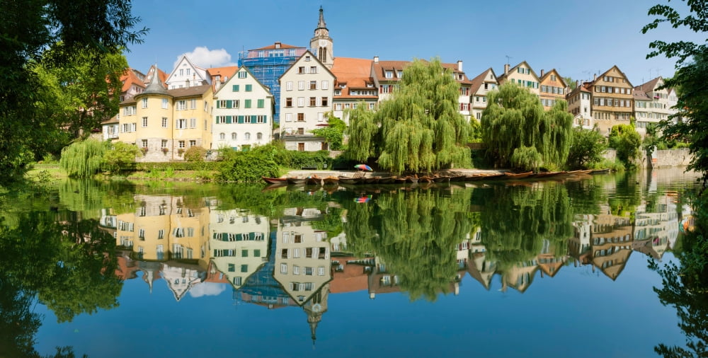 Old town buildings reflecting in Neckar River Tubingen Baden-Wurttemberg Germany Canvas Art - Panoramic Images (12 x 24)