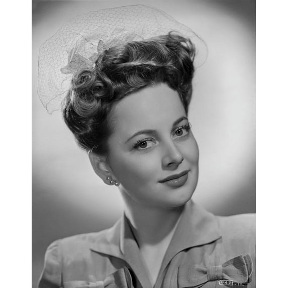 Olivia DeHavilland Portrait in Blouse with Earrings Photo Print (8 x 10)