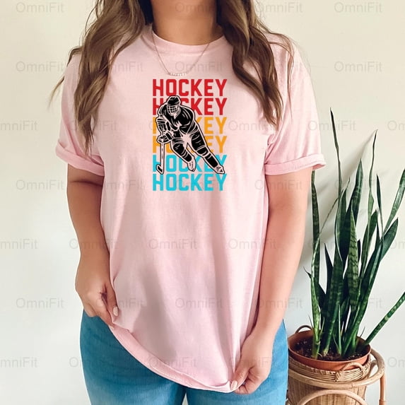 OmniFit25 Hockey Player Silhouette Graphic, Classic Ice Sport Action, Game Day Fan Apparel T-Shirt, for Unisex, up to size 5XL.