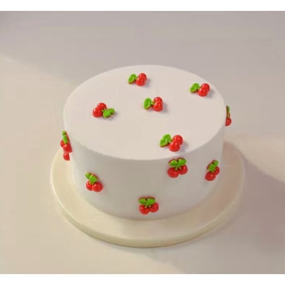 One random model contains a realistic cake display prop; this decorative cake model is suitable for store, home décor, and party displays.
