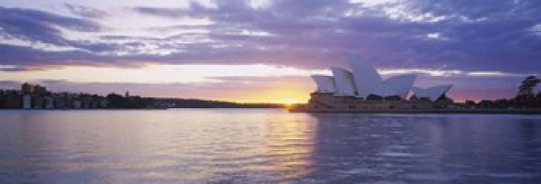 Opera house at the waterfront Sydney Opera House Sydney New South Wales Australia Canvas Art - Panoramic Images (18 x 7)