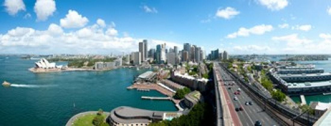 Opera house with city skyline Sydney Opera House Sydney New South Wales Australia 2012 Canvas Art - Panoramic Images (15 x 6)