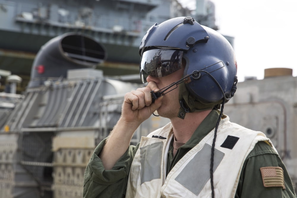 Operations Specialist radios instructions from a landing craft air cushion Canvas Art - Stocktrek Images (34 x 23)
