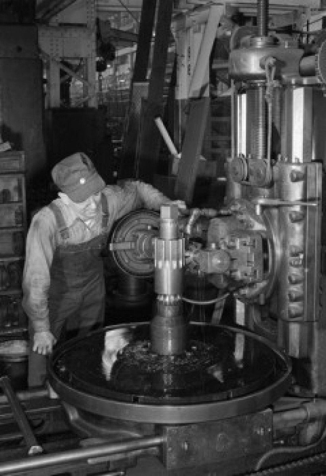 Operator cutting a gear on a gear hobbing machine Canvas Art - (24 x 36)