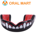 thumbnail image 1 of Oral Mart Youth Mouth Guard for Kids - Vampire Fangs, Children Mouthguard for Sports, 1 of 10
