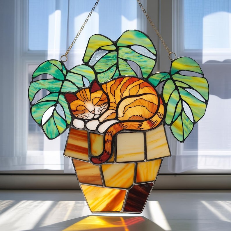 Orange Cat Plant Pot Acrylic Suncatcher, Sleeping Tabby in Monstera ...