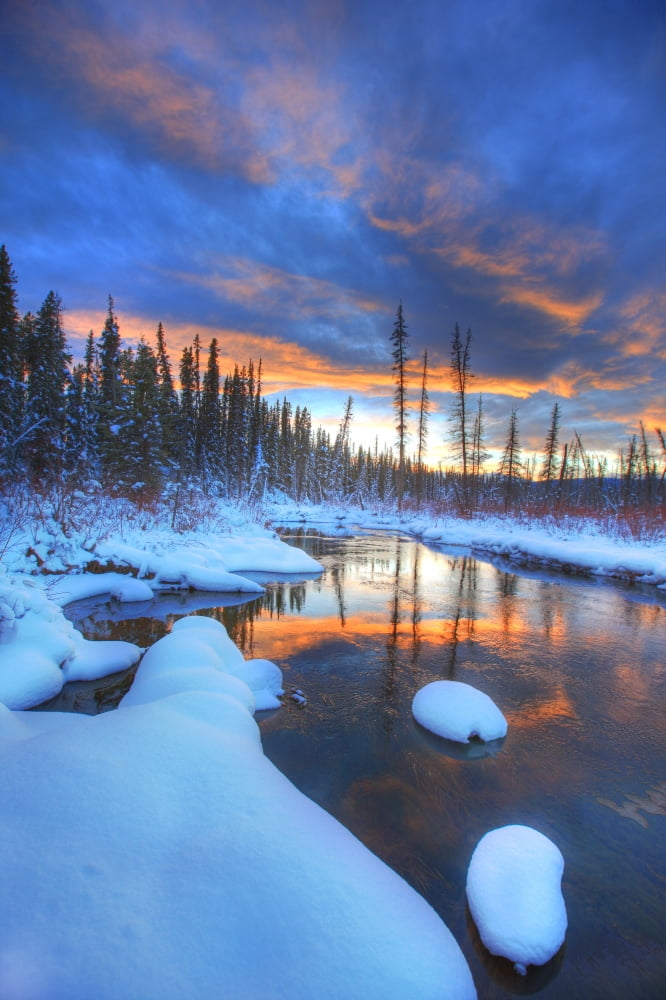 Orange Clouds At Sunset And Little Hazel Creek Yukon Canvas Art - Robert Postma Design Pics (22 x 34)