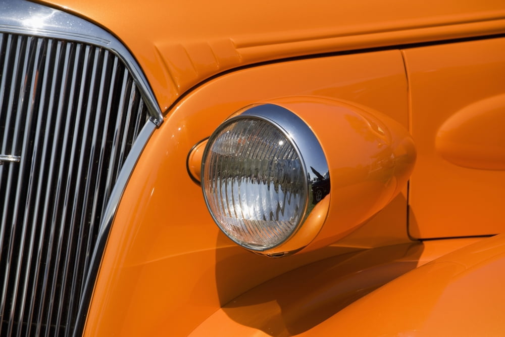Orange Painted Vintage Cars Headlight And Front Grill Port Colborne Ontario Canada Canvas Art - Michael Interisano Design Pics (40 x 26)