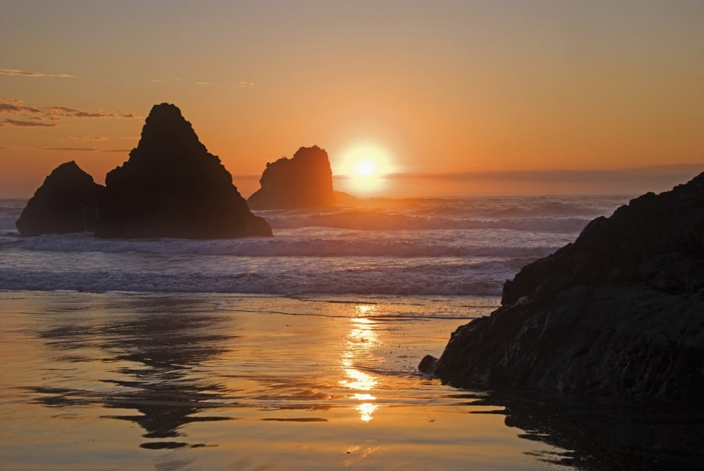 Orange sunset behind offshore rocksBandon oregon united states of america Canvas Art - Philippe Widling Design Pics (36 x 24)