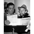thumbnail image 1 of Orchestra Leader John Scott Trotter And Bing Crosby Go Over Lyrics For "Home On The Range" And "The Caissons Go Rolling Along" - Requested By General Macarthur For Broadcast To The Philippines History, 1 of 1