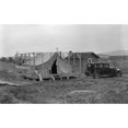 thumbnail image 1 of Oregon Farm 1939. Na Tenant Farmer Building A House Around A Tent Near Klamath County Oregon. Photograph By Dorothea, 1 of 3