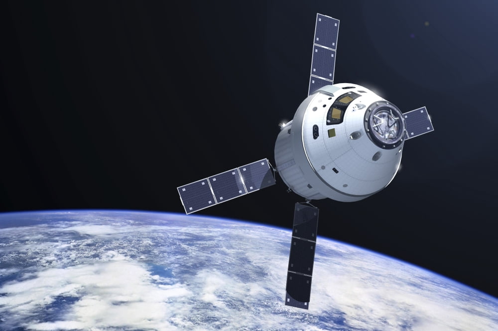 Orion module in orbit above Earth Canvas Art - Adrian MannStocktrek Images (17 x 12)