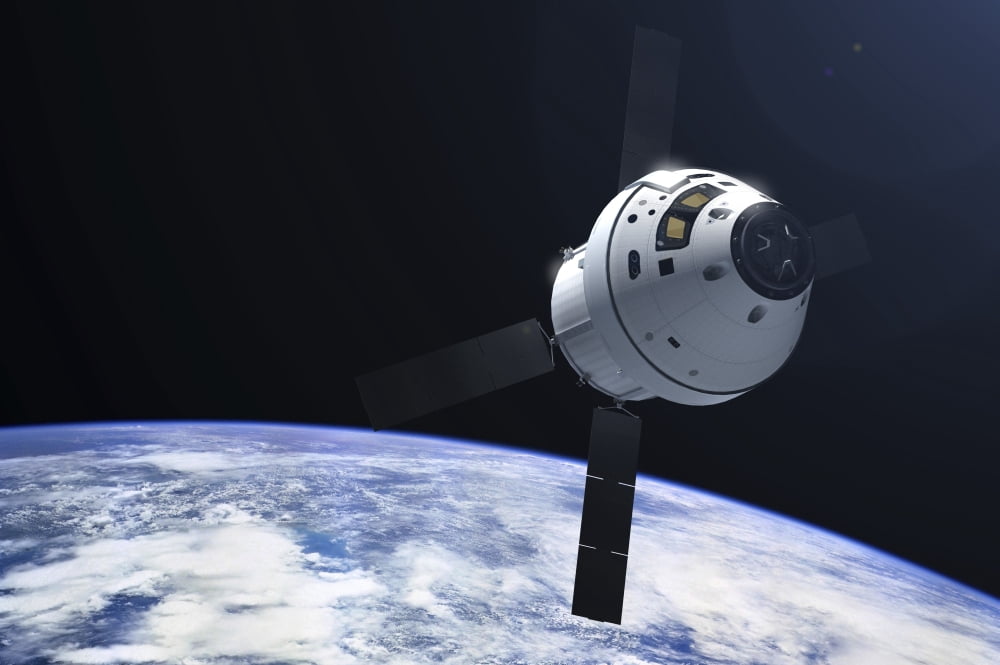 Orion module in orbit above Earth Canvas Art - Adrian MannStocktrek Images (34 x 23)