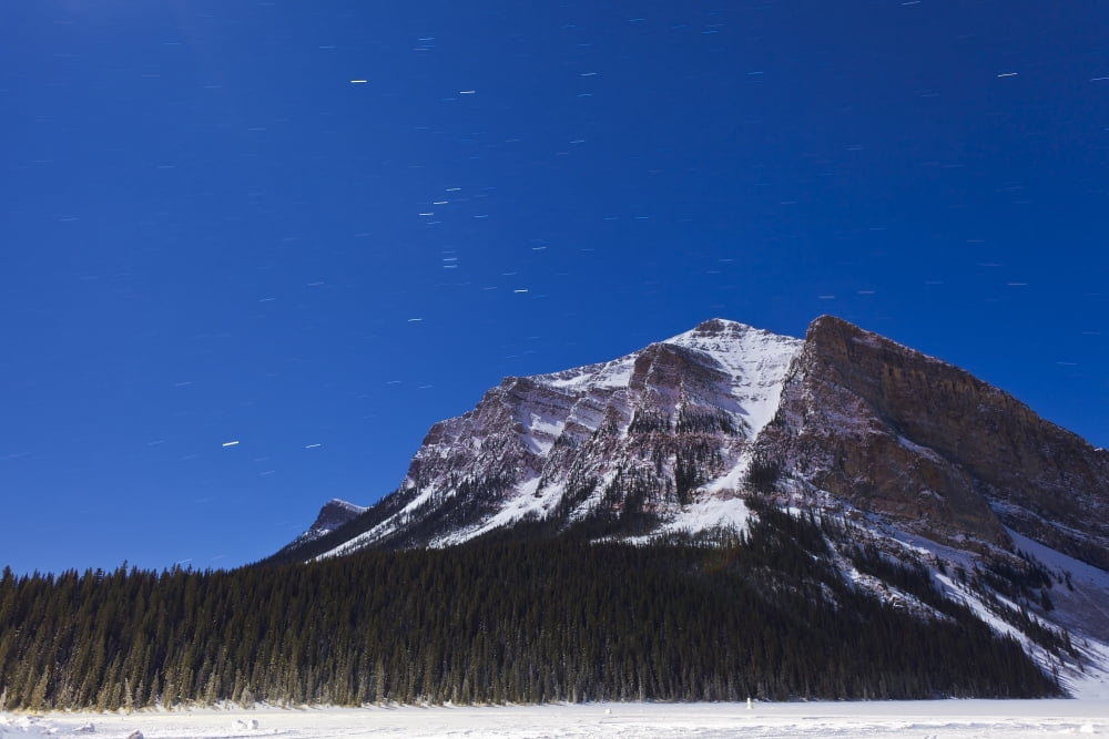 Orion star trails above Mount Fairview Alberta Canada Canvas Art - Alan DyerStocktrek Images (35 x 23)