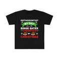 thumbnail image 1 of Orthodontist by day Binge Eater by Christmas Unisex T-shirt S-3XL, 1 of 2