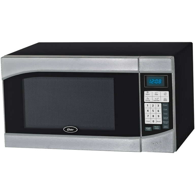 OSTER 1.1 CU. FT. COUNTERTOP MICROWAVE OVEN pre owned