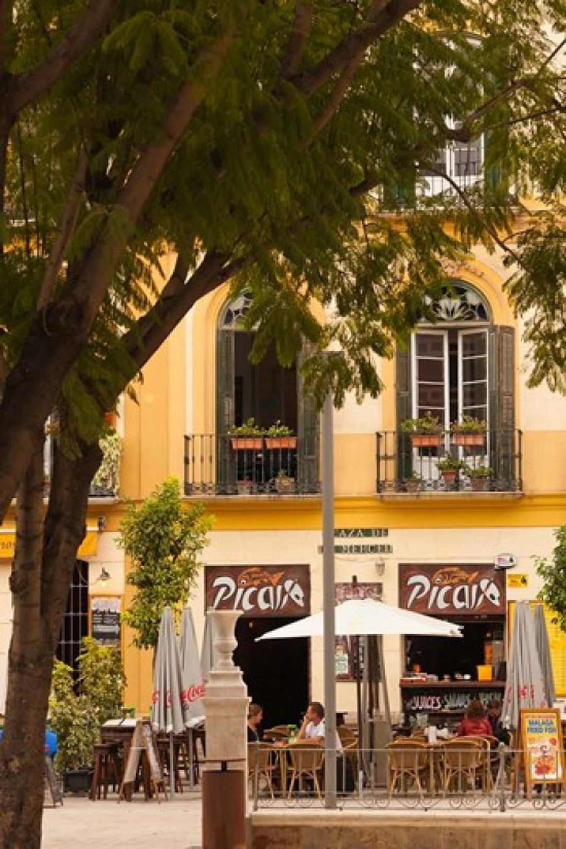 Outdoor Cafes Plaza de la Merced Malaga Spain Canvas Art - Walter Bibikow DanitaDelimont (25 x 38)
