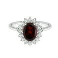 thumbnail image 1 of Oval 1.00 Ctw Red Garnet 7X5 MM 925 Sterling Silver Solitaire Accents Women Wedding Ring, 1 of 5