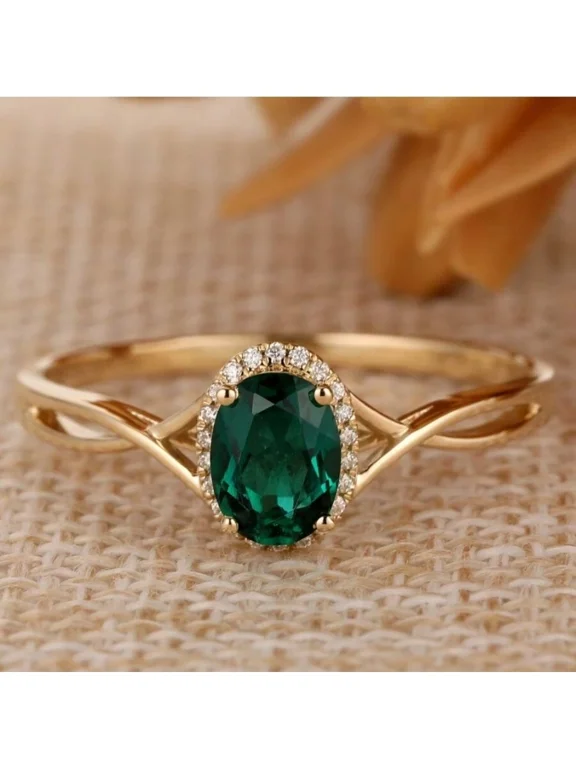 Oval Green Cubic Zirconia Halo Ring In Goldtone With Side Stones