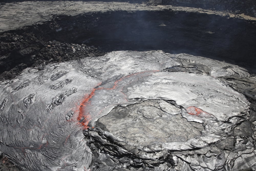 Overflowing lava lake in pit crater Erta Ale volcano Afar region Danakil Depression Ethiopia Canvas Art - Richard RoscoeStocktrek Images (18 x 12)