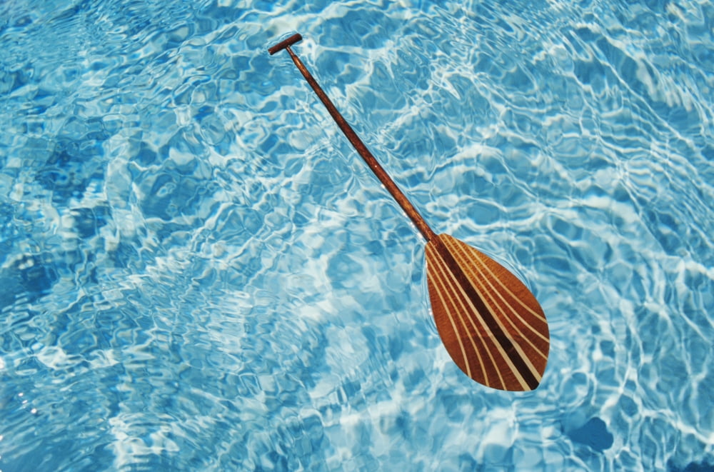 Overhead View Of Paddle Floating On Surface Of Turquoise Water Canvas Art - Joss Descoteaux  Design Pics (17 x 11)