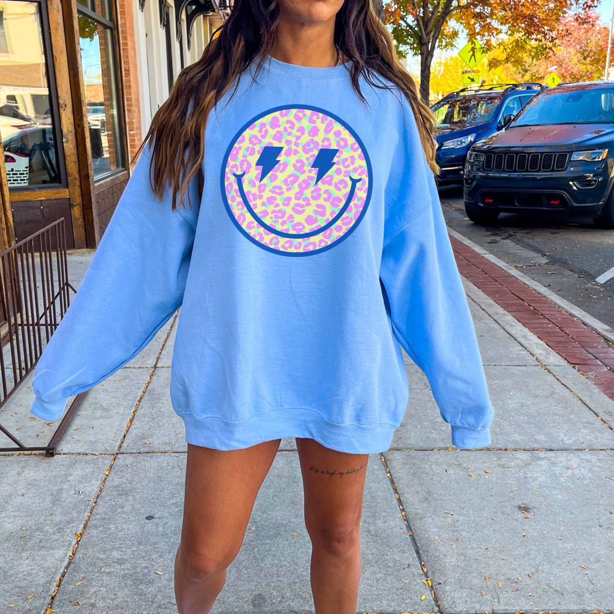 Oversized Smiley Face Leopard Print Lightning Bolt Sweatshirt, Smiley