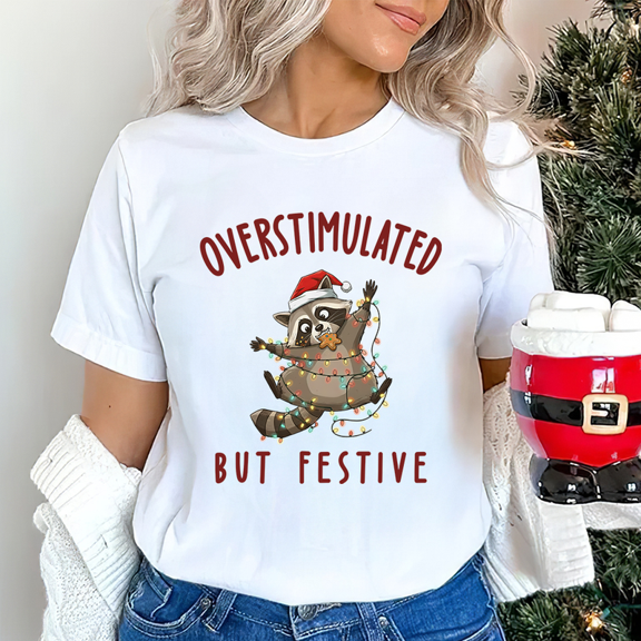 Overstimulated But Festive Christmas T-Shirt, Funny Holiday Raccoon Graphic Tee — Great for Christmas Gifting