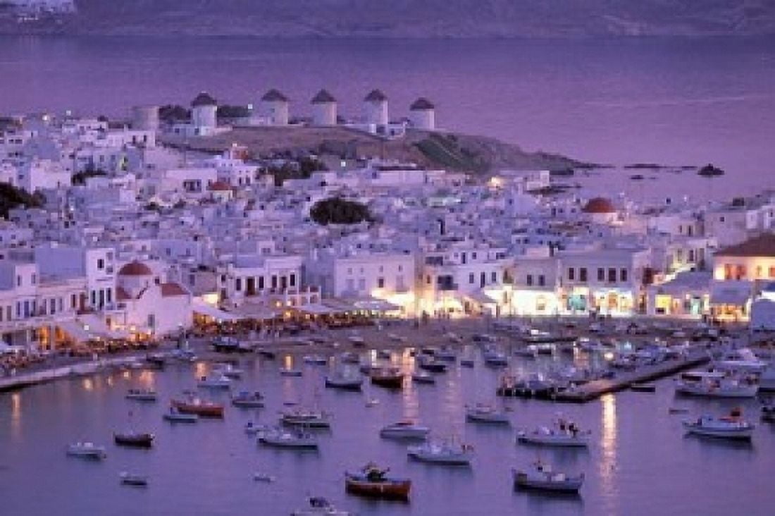 Overview of Mykonos Town harbor Mykonos Cyclades Islands Greece Canvas Art - Walter Bibikow DanitaDelimont (24 x 15)