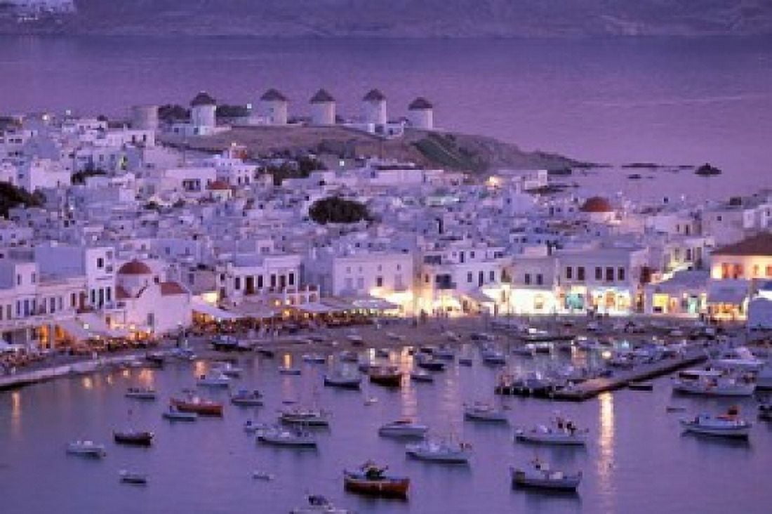 Overview of Mykonos Town harbor Mykonos Cyclades Islands Greece Canvas Art - Walter Bibikow DanitaDelimont (35 x 23)