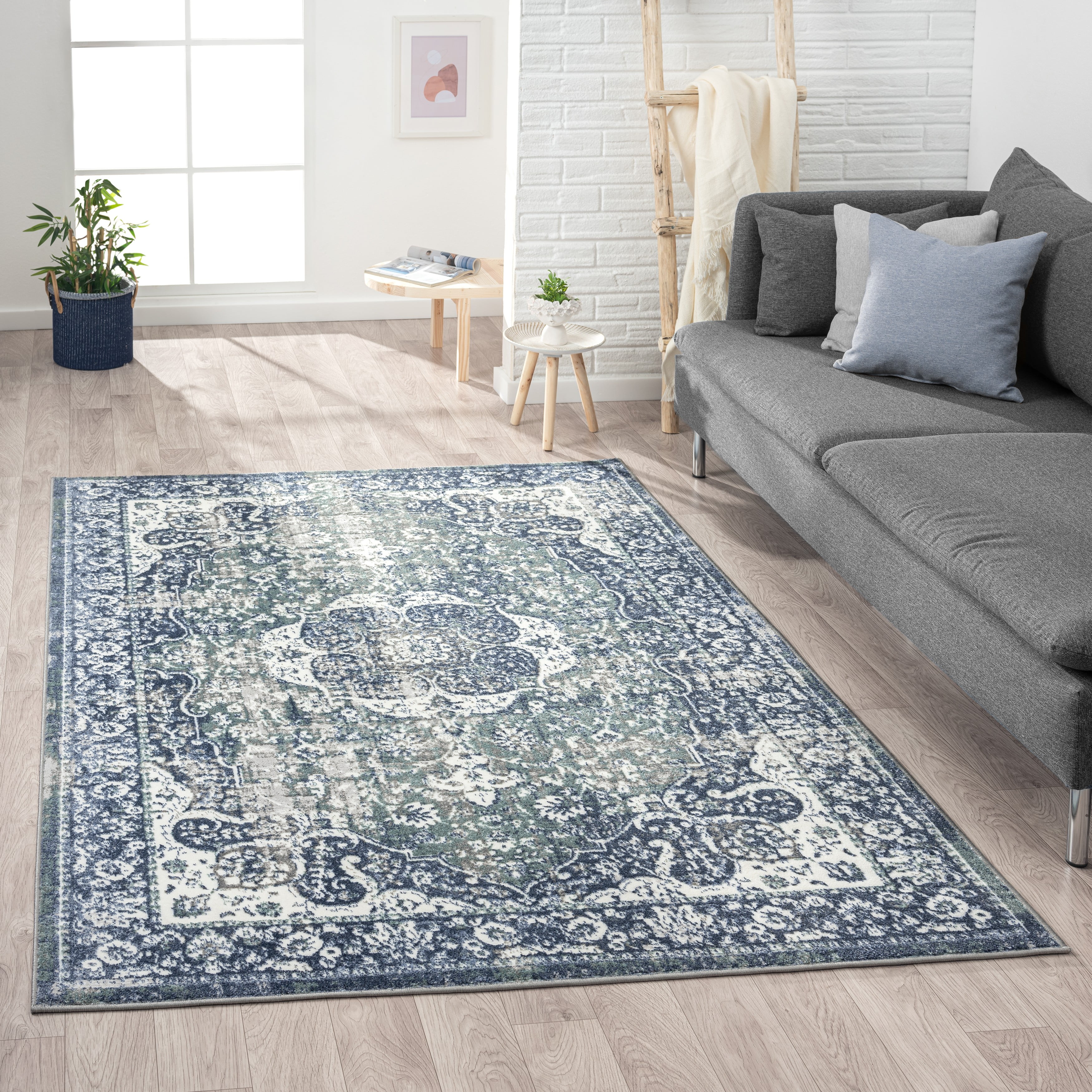Blue and Beige Medallion Synthetic 5' x 7' Area Rug