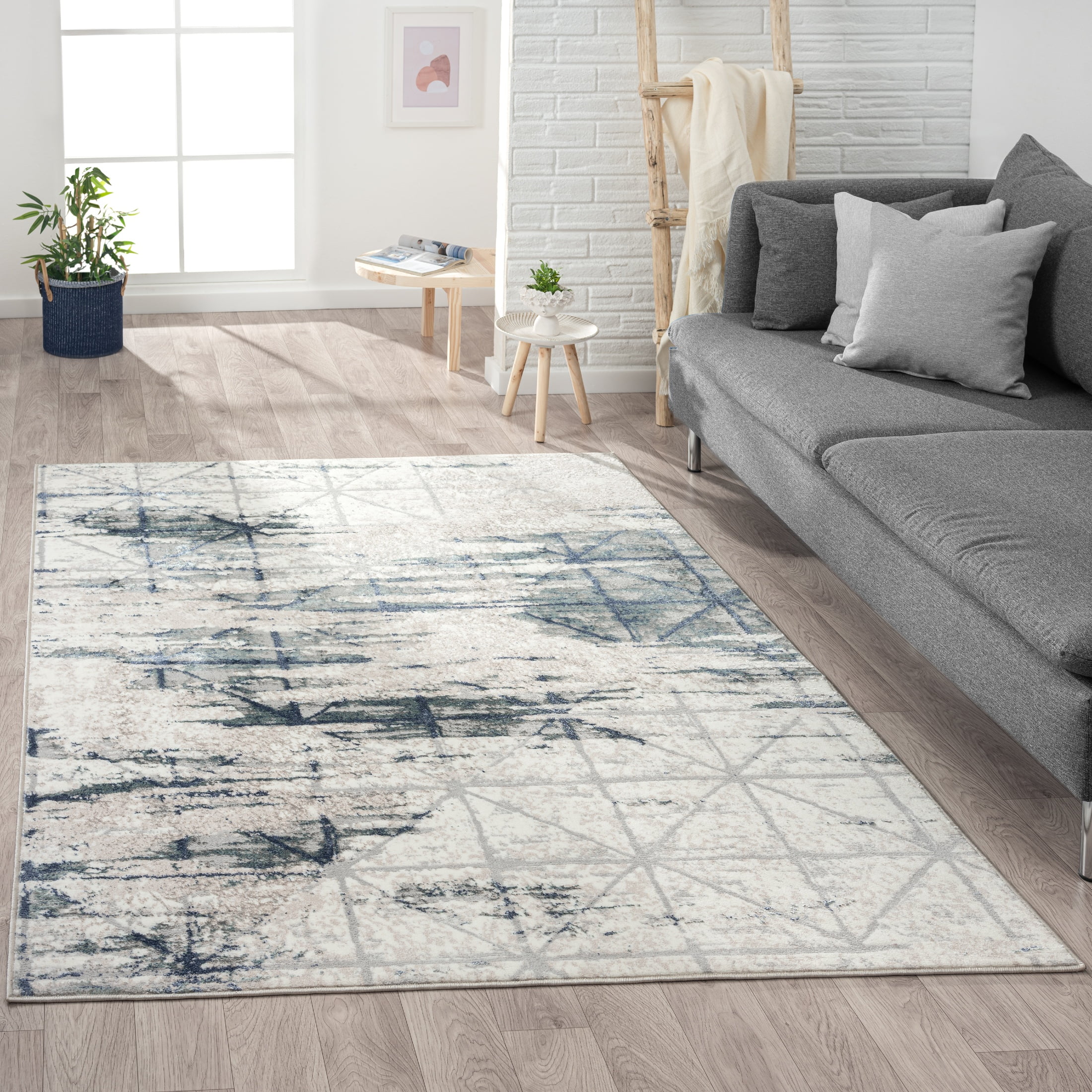 Blue and Beige Geometric 5' x 7' Stain-Resistant Synthetic Area Rug