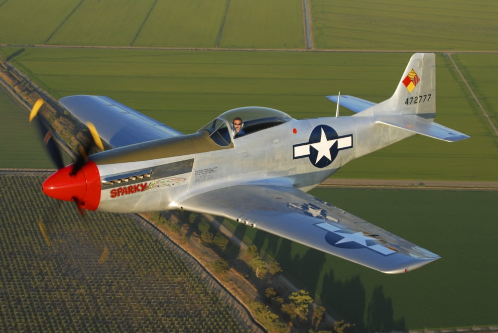 P-51D Mustang flying over Chino California Canvas Art - Phil WallickStocktrek Images (17 x 12)