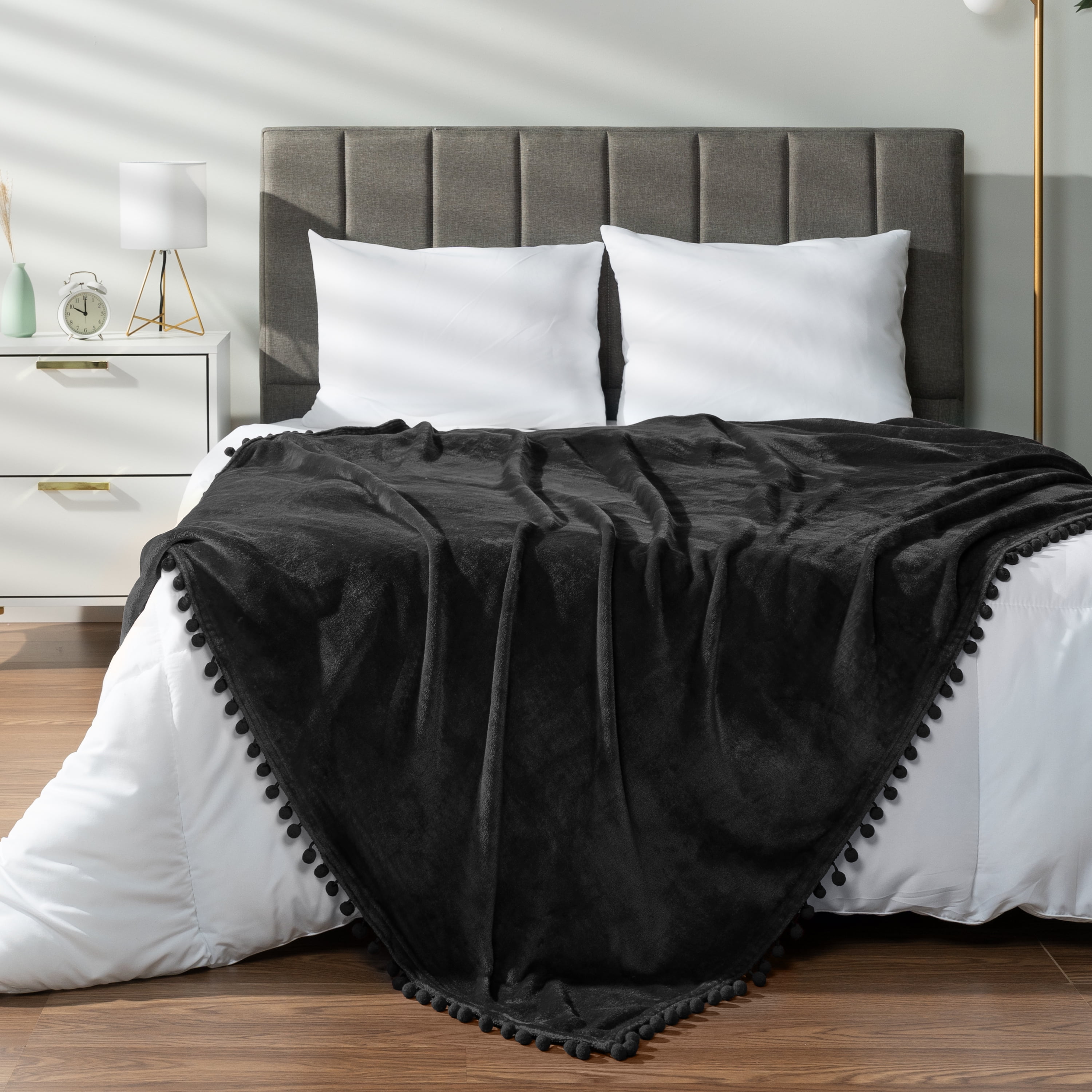 PAVILIA Fleece Throw Blanket for Couch with Pom Pom Fringe, Black, Soft Cozy Fuzzy Flannel Blanket for Sofa Bed, Large Lightweight Plush All Season Throw, 60x80 Inches
