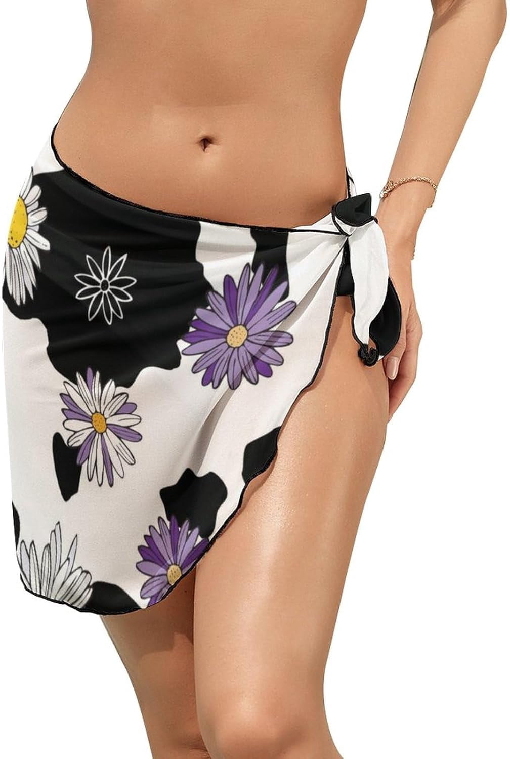 Kimono avec manches 3/4. Coupe ouverte et ceinture à nouer. Imprimé