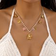 thumbnail image 1 of PISONIC Women Boho Imitation Pearl Beaded Choker Necklace, Gold‑Tone Multi Charms Necklace with Flower, Butterfly, Sun, Cactus & Leaf Pendants, Sweet Summer Casual Statement Jewelry for Ladies, 1 of 5