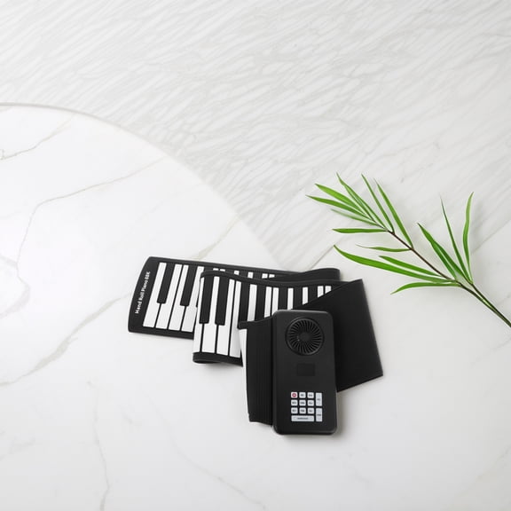 PTOOTP Portable Electronic Keyboard with Built-in Speaker, Soft Silicone Keys, Compact Black Design for Music