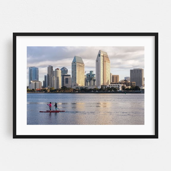 Paddleboarding Serenity - Photography Cityscape Skyline Harbor City Architecture Seaside Water Black Framed Wall Art Print 5 x 7 inches