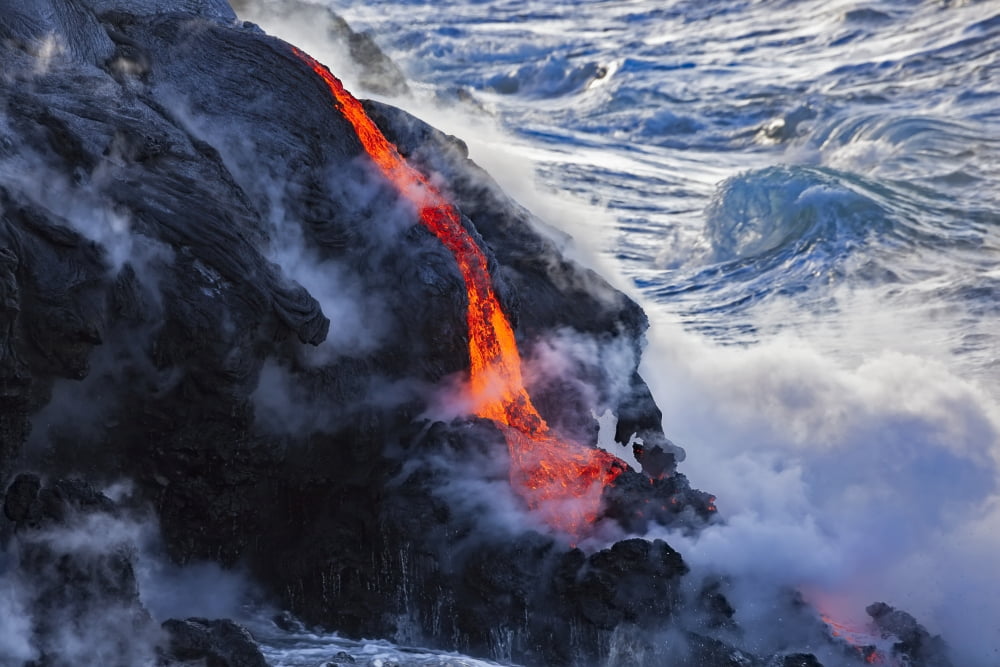The Pahoehoe lava flowing from Kilauea has reached the Pacific ocean near Kalapana Island of Hawaii Hawaii United States of America Canvas Art - Dave Fleetham Design Pics (38 x 24)