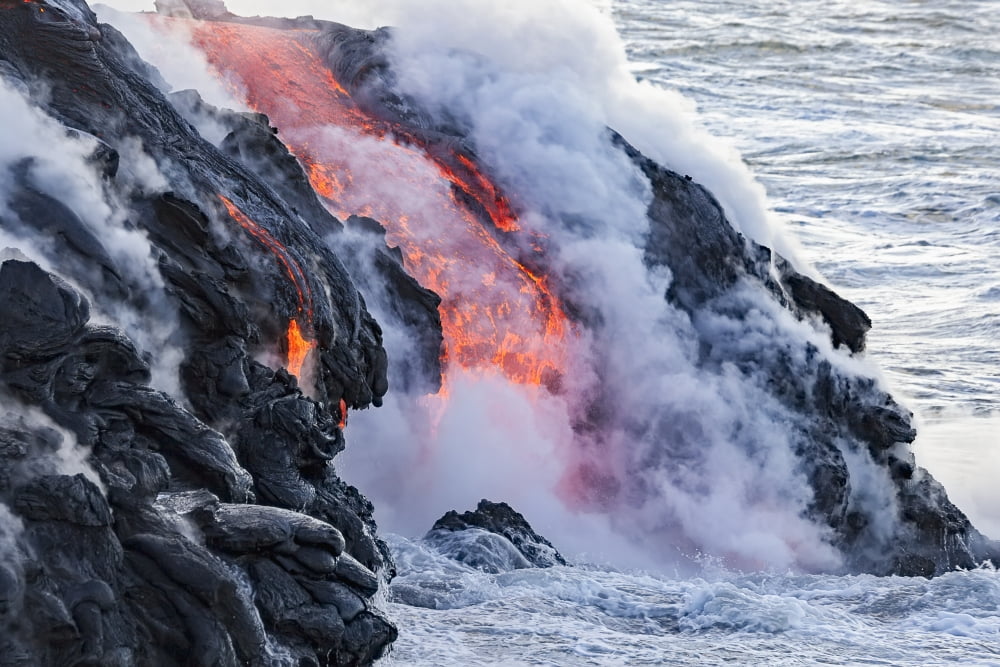 The Pahoehoe lava flowing from Kilauea has reached the Pacific ocean near Kalapana Island of Hawaii Hawaii United States of America Canvas Art - Dave Fleetham Design Pics (38 x 24)