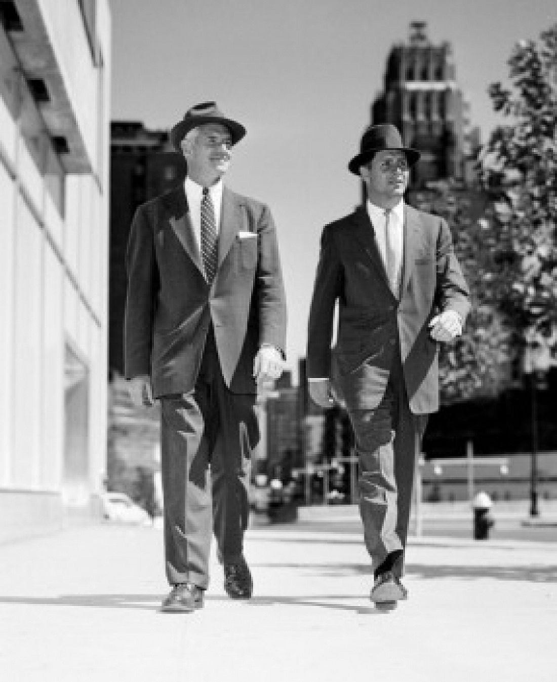 Pair of businessmen walking in downtown Canvas Art - (24 x 36)